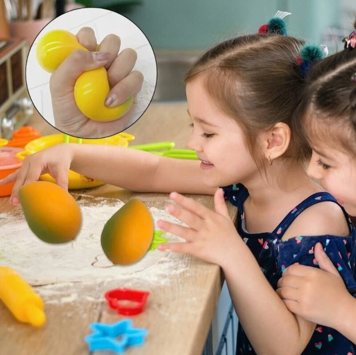Galaxy Mango Gniotek Antistresinis spaudžiamas vaisius, sensorinis oranžinis žaislas