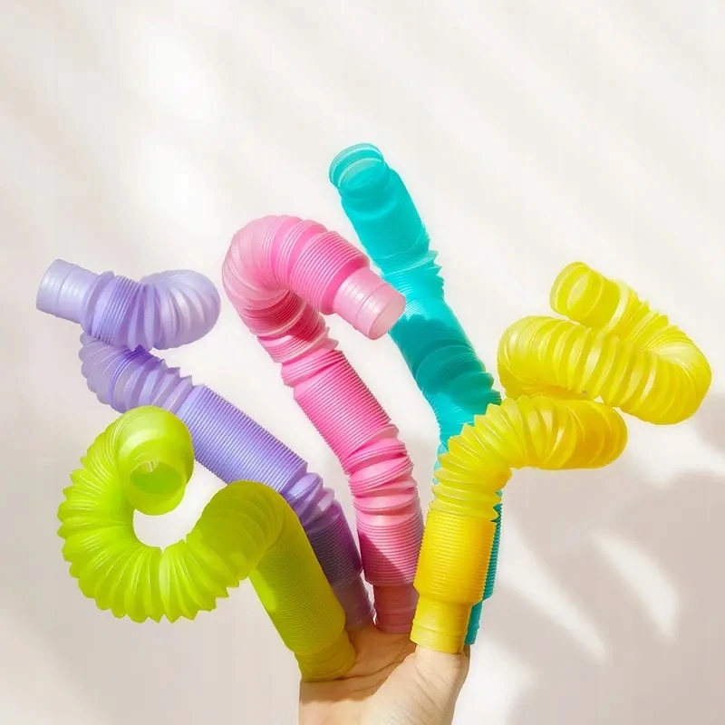 Glow Pop spyruoklės, jutimo vamzdeliai, skirti tempti ir švytinti mideer kamuoliukus