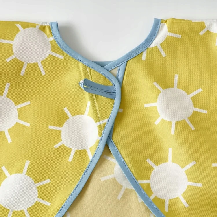 IKEA KLADDIG Prijuostės seilinukas su rankovėmis, geltonas