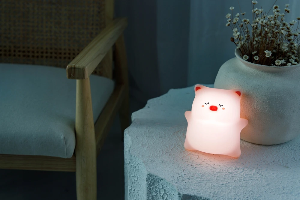 InnoGIO vaikiška naktinė lemputė silikoninė LED piggy touch minkšta