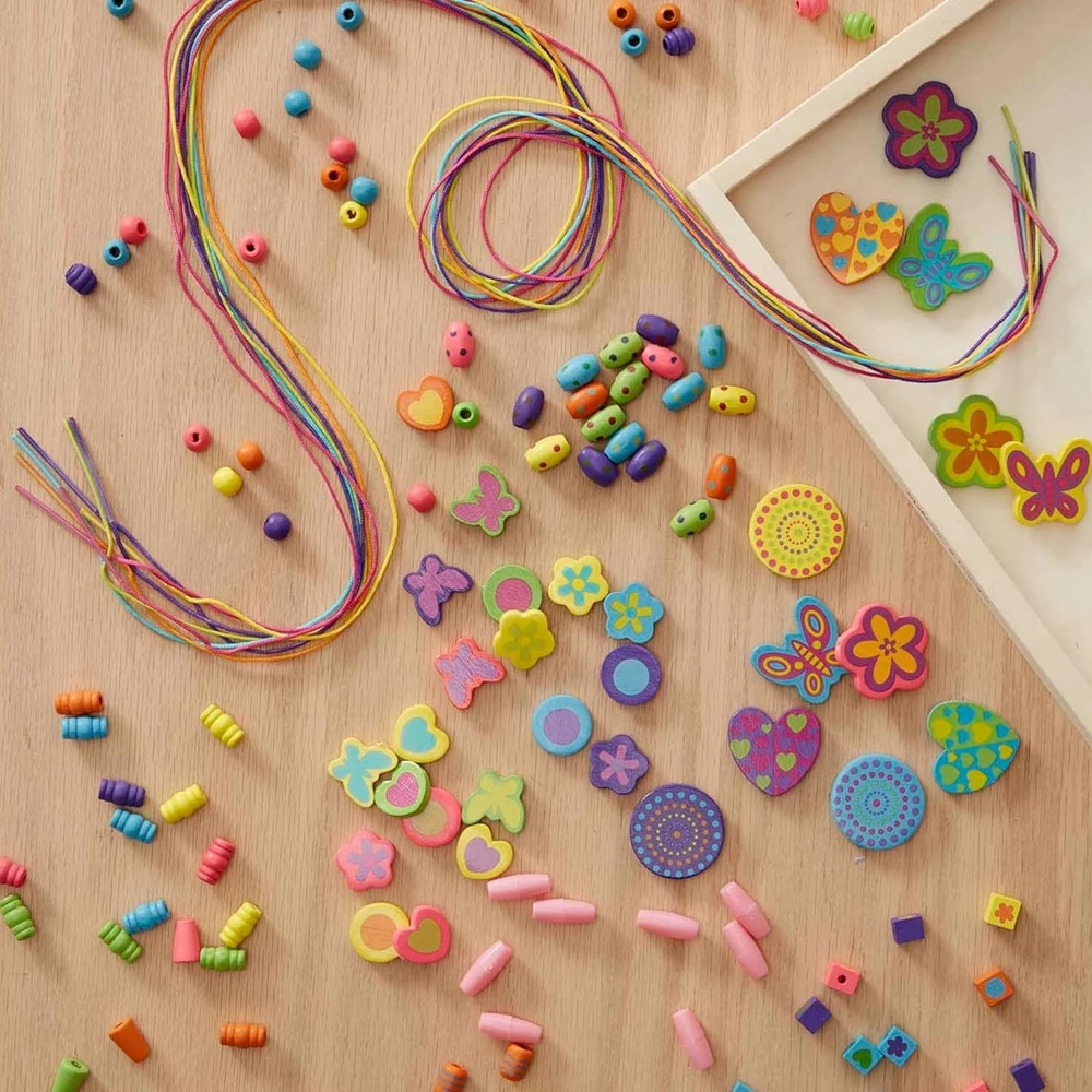 Melissa & Doug Medinių karoliukų vėrimo rinkinys Delux 220 d. Melissa ir Dougas, 14169