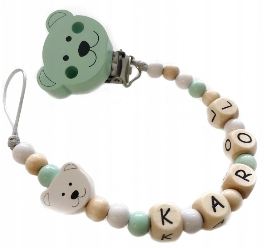 Lis čiulptuko pakabukas su pavadinimu, lenkiškais rašmenimis