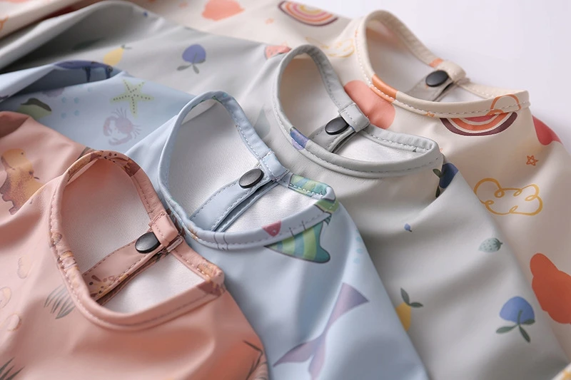 MilaBaby Guminė prijuostė su rankovėmis ir Pocket Premium 6M+
