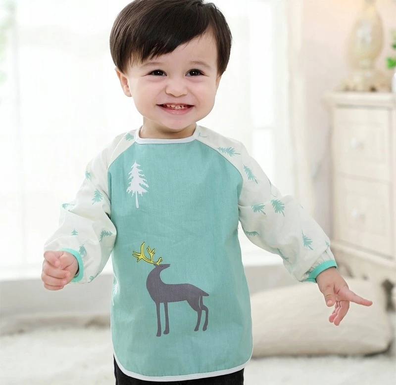 Milababy Kvėpuojantis seilinukas, atsparus vandeniui po kaklu. Elegantiškas