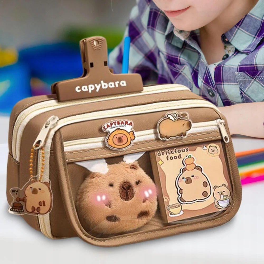 Modebelle TRIJŲ SKYRIŲ CAPYBARA MOKYKLINĖ PAŠIMTINĖ DĖŽĖ SU PRIEDAIS