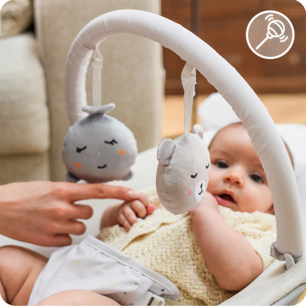MoMi GLOSSY smėlio spalvos kūdikių bouncer - melodijos, vibracijos, žaislai