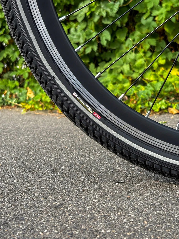 Opona rowerowa 26 TRC 26x1.75 47-559 ANTYPRZEBICIE balta dirželis odblaskowy