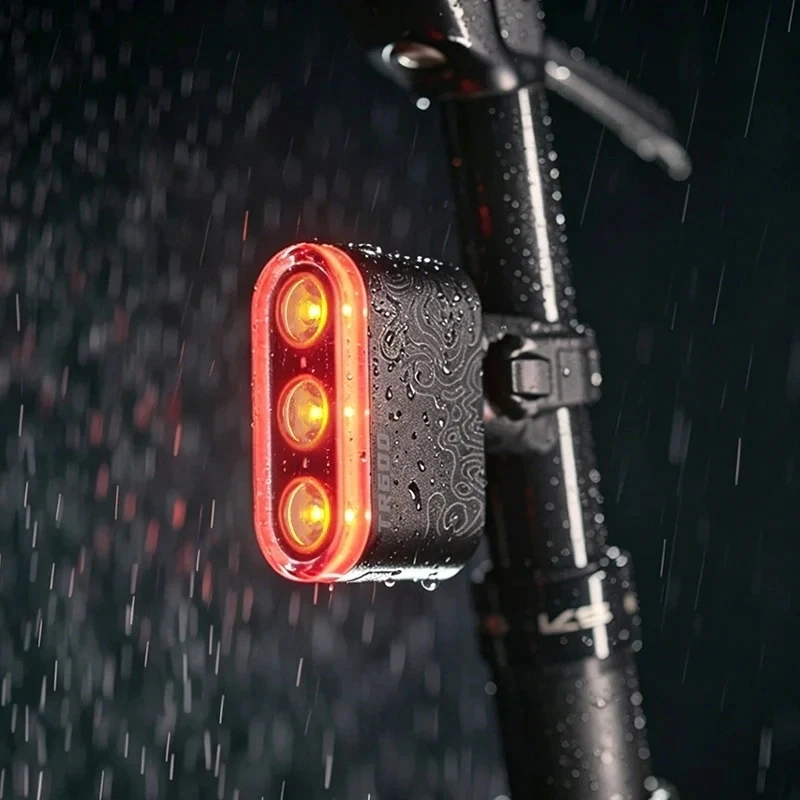 RAVEMEN TR600 dviračio galinis žibintas 600 lm USB-C IPX6 stabdžių jutiklis