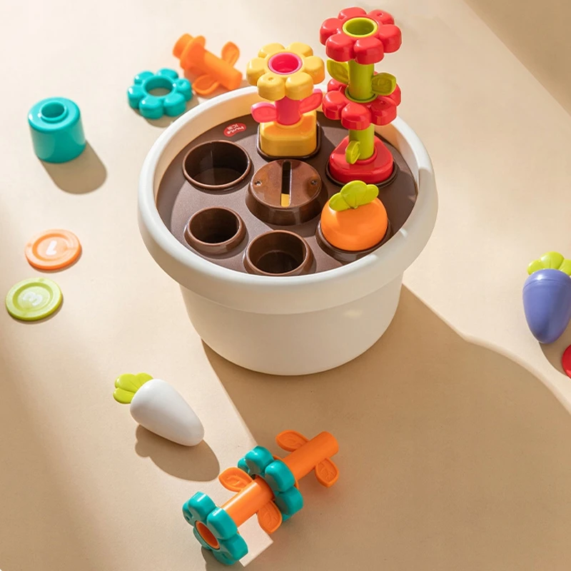 SENSORY SORTER Hola vazonas Magnetinė piramidė Blokai Gėlės 12m+