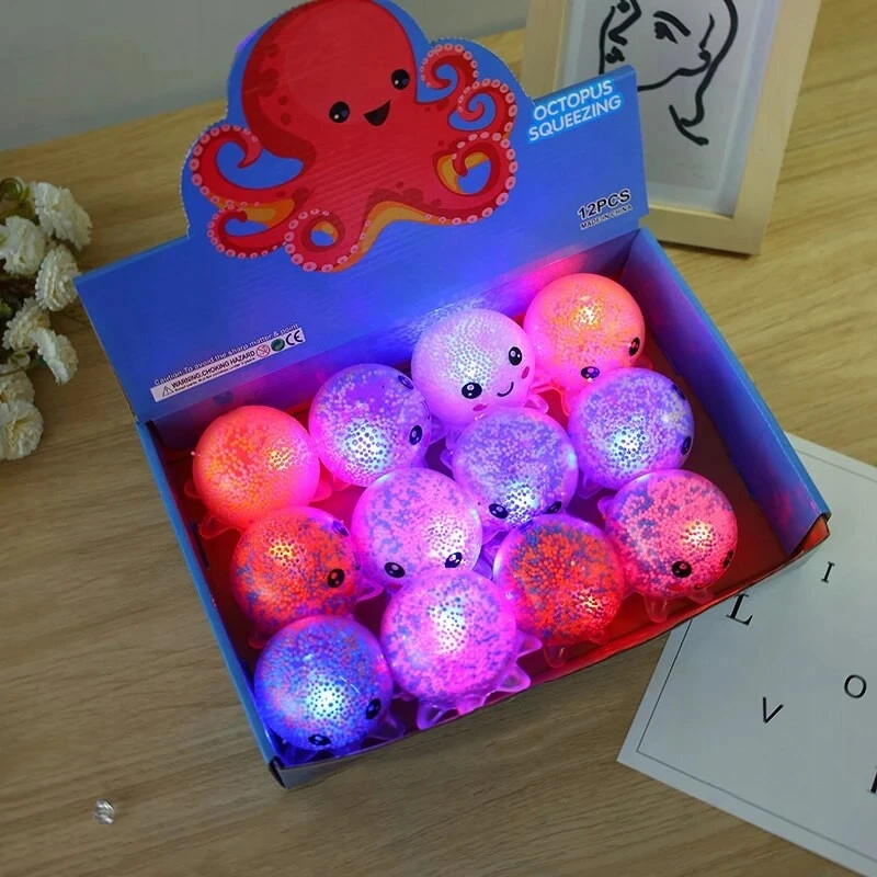 SQUISHY Octopussy GNIOTEK GLOWING LED TOY GLOWING OCTOPUS ŽAIDIMAS