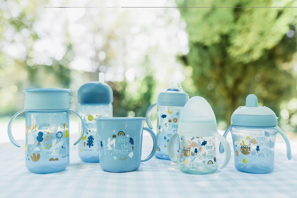 SUAVINEX FOREST - buteliukas, neišsiliejantis plastikinis puodelis, 200ml, 6m+ (mėlyna)