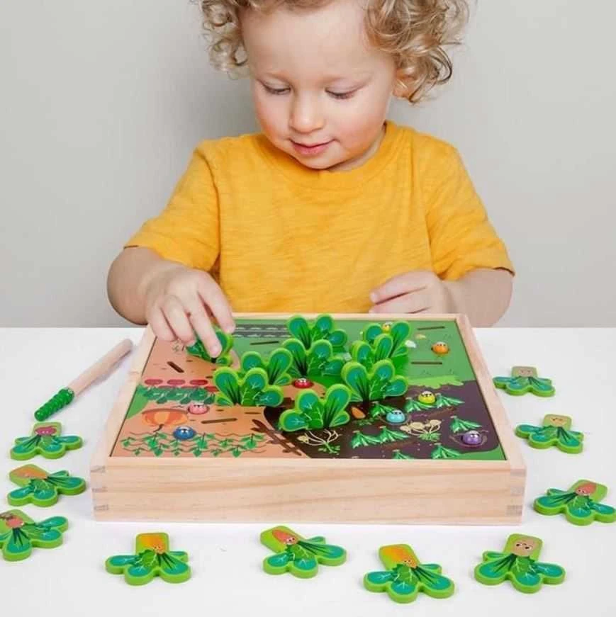 Montessori stalo žaidimas - kirmėliukai ir daržovės sode