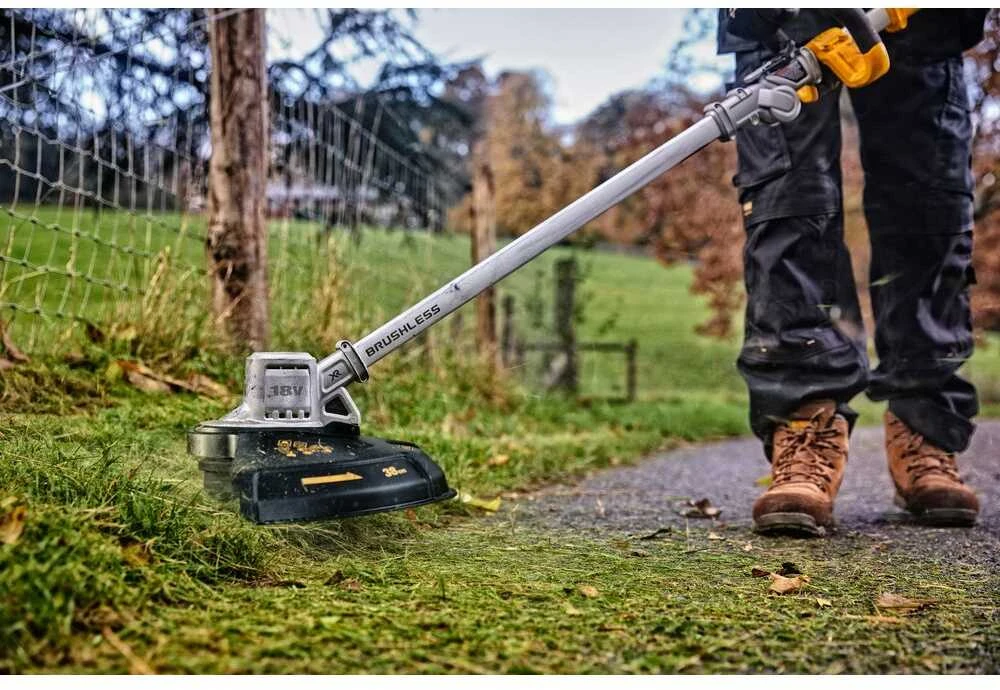 Žoliapjovė - trimeris DeWalt DCMST561N-XJ; 18 V (be akumuliatoriaus ir pakrovėjo)