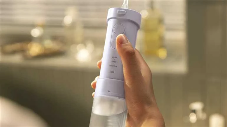 Tarpdančių irigatorius Philips HX3333/23 Compact Flosser1000