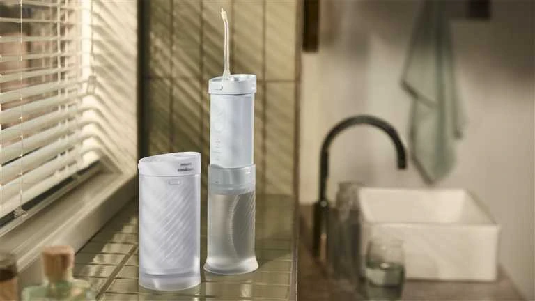 Burnos irigatorius Philips Sonicare Compact Flosser 1000 HX3333/24, mėlynas