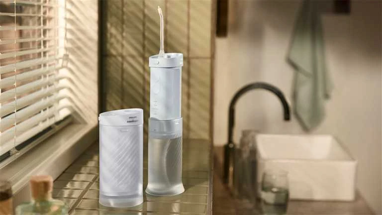 Burnos irigatorius Philips Sonicare Compact Flosser 1000 HX3333/24, mėlynas