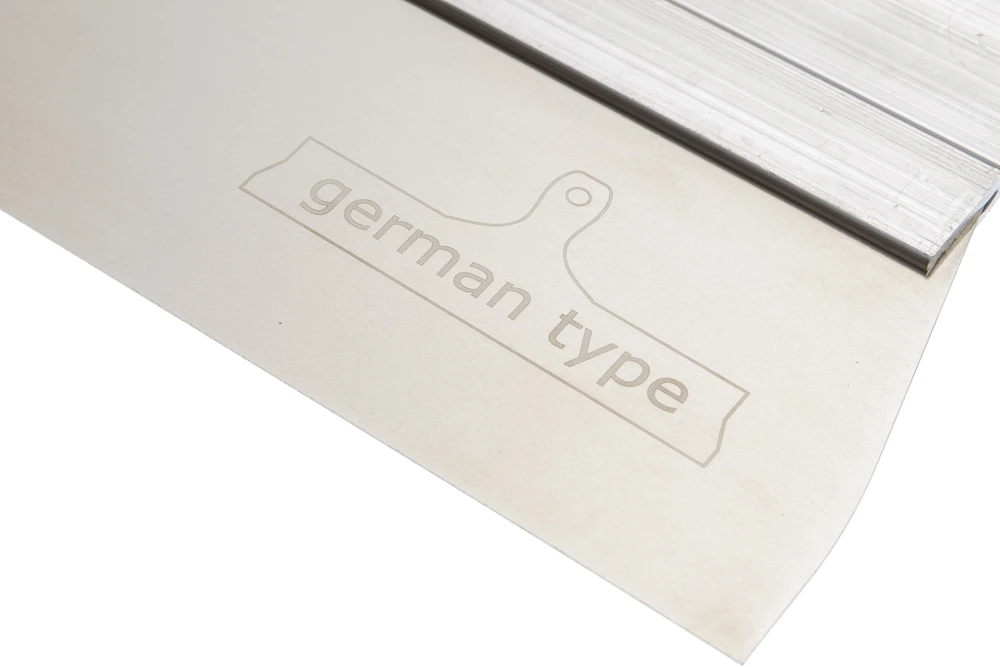 Metalinė glaistymo mentelė su german type įspaudu