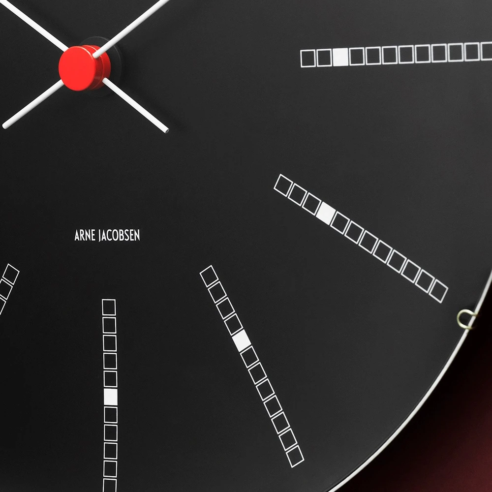 Arne Jacobsen Clocks Arne Jacobsen - Bankininkų sieninis laikrodis - Ø21 cm - Juodas