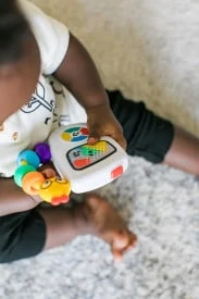 Baby Einstein Kūdikis Einšteinas - muzikinis žaislas, „Take Along Tunes™“ - (BE-30704)