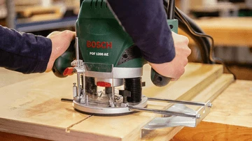 Vertikalioji frezavimo mašina Bosch POF 1200 AE