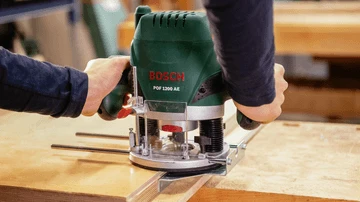 Vertikalioji frezavimo mašina Bosch POF 1200 AE