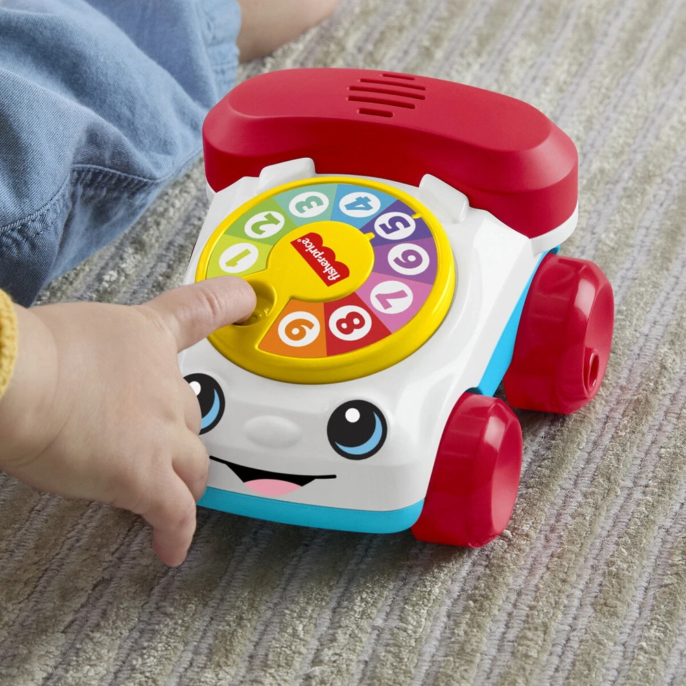 Fisher-Price - klasikinė „Chatting“ telefono transporto priemonė (JKD56)