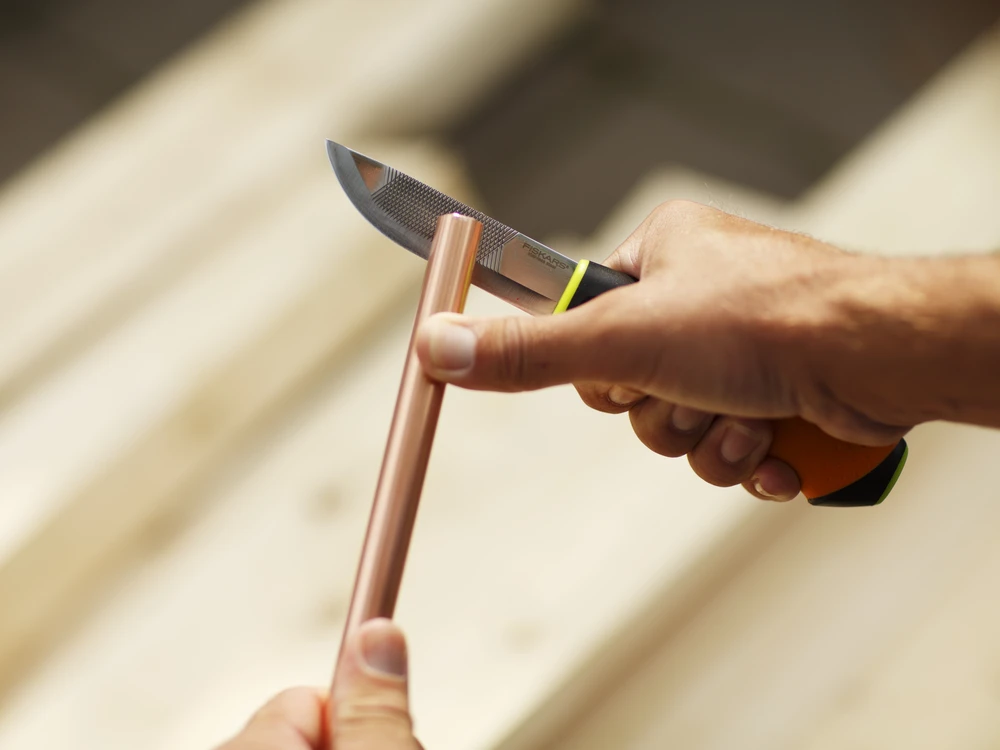 Fiskars - tvirtas peilis su galąstuvu