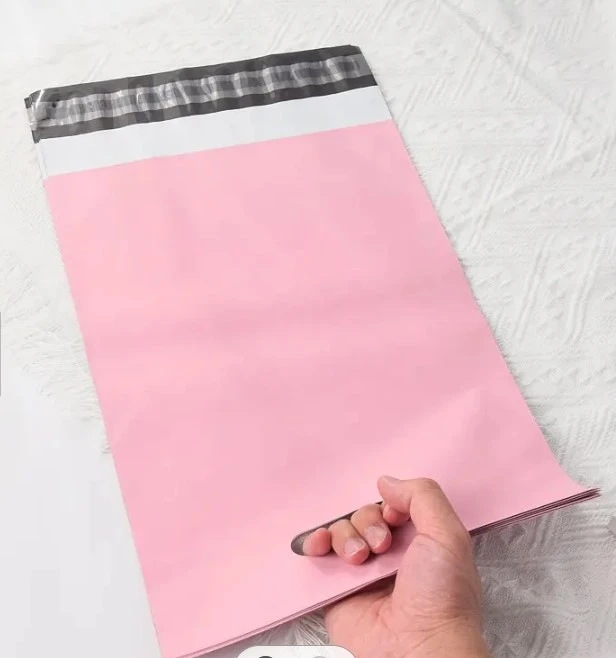Foliopaki ROŽINIAI KURJERIO POLIMAIŠELIAI SU RANKENA 260x350+70 50 vnt.