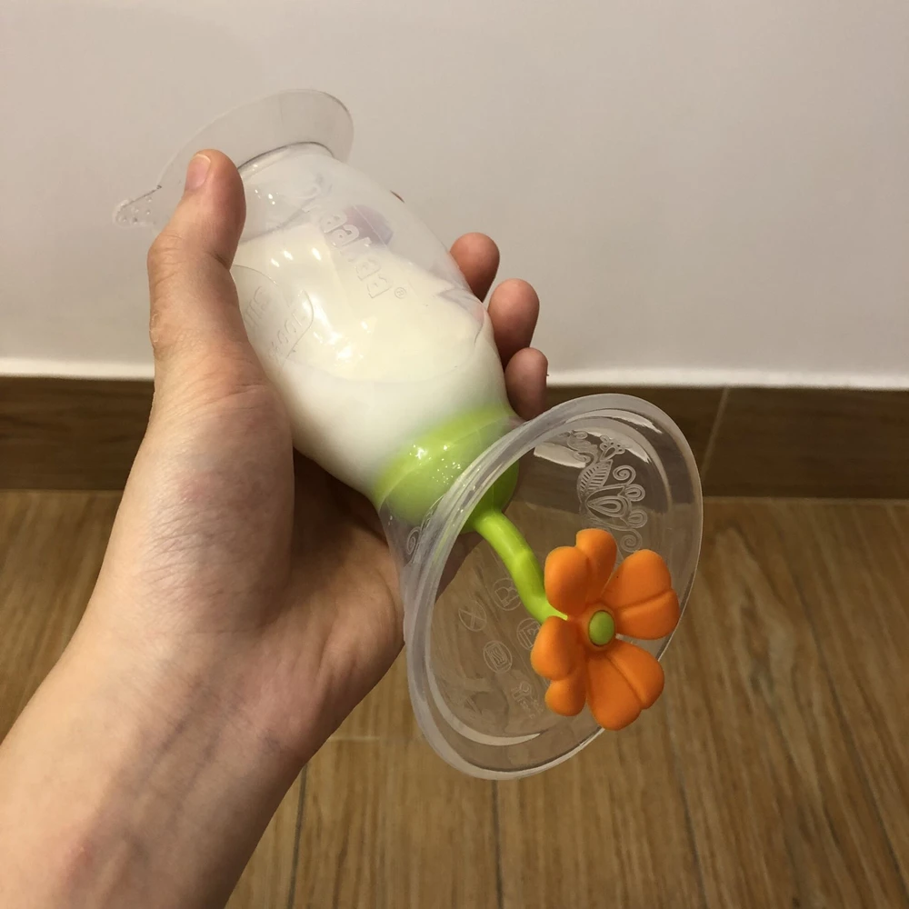 „Haakaa“ – 2 kartos silikoninis krūties pompos ir žiedo kamštelio rinkinys – 100 ml