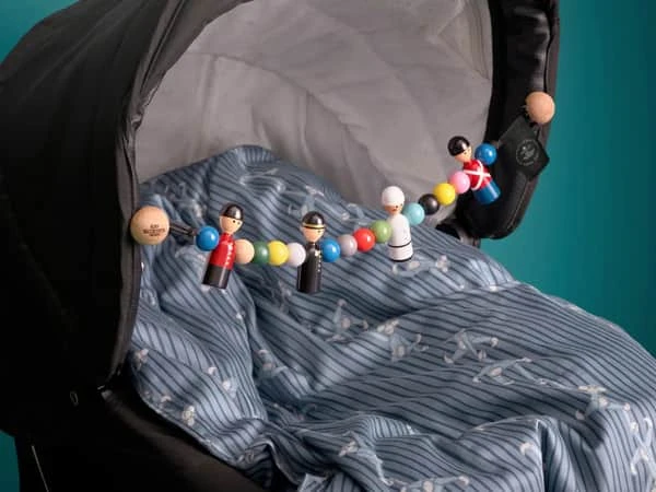 Kay Bojesen – „Baby Pramchain Multi“.