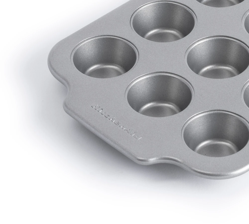 KitchenAid - Metalinės kepimo formos, mini apvalios kepimo formos, 12 vnt. - sidabrinės