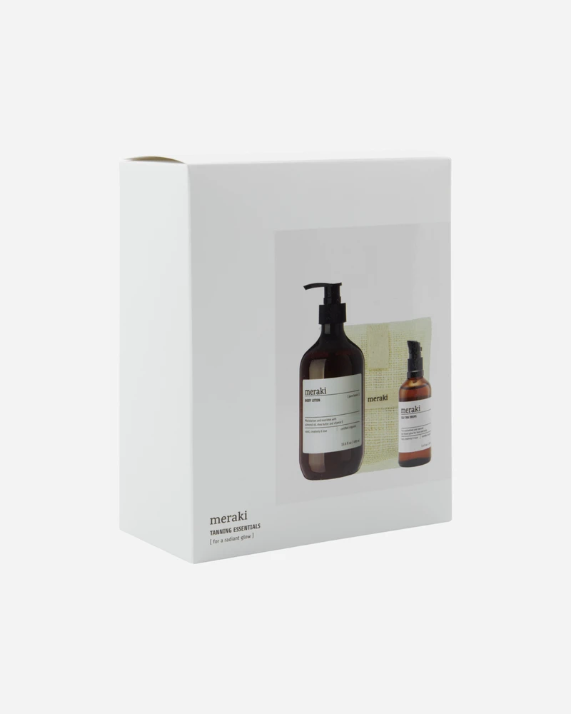 „Meraki“ – dovanų dėžutė su savaiminio įdegio lašais, vonios pirštine, kūno losjonu – balta – 140 g, 100 ml, 490 ml