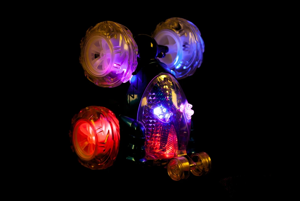 Tec Toy Crazy Tumbler - Akrobatinis automobilis su žibintuvėliu - Radiovadomas 2,4 GHz - Oranžinis (534444)