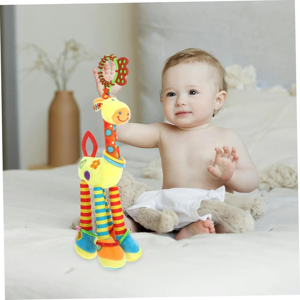 Minkštas žaislas kūdikio vežimėliui ir loveliui Giraffe