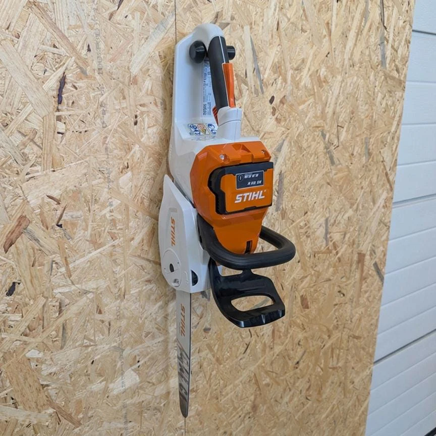 Garageprintslt Stihl MSA serijos grandininio pjūklo sieninė laikiklis