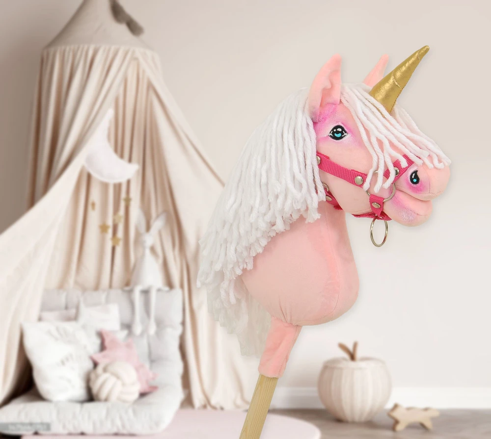 Super Hobby Horse Hobby Horse vienaragis ant lazdos rožinis su balta karčiene ir auksiniu ragu