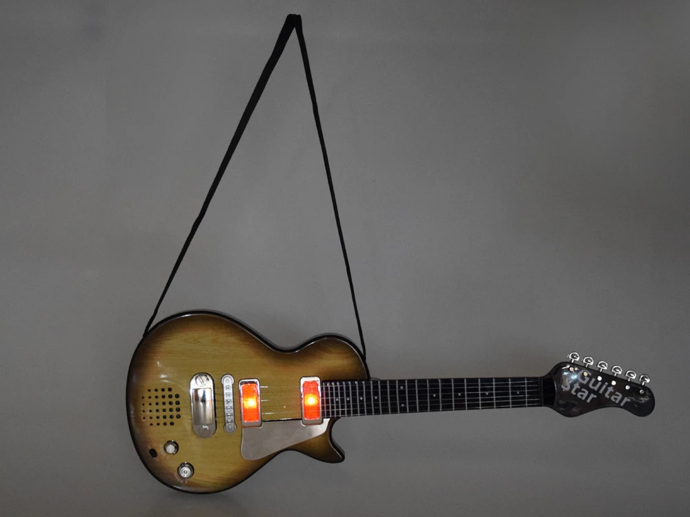 Jokomisiada Elektrinės gitaros žaislas vaikams melodijos šviesa + dirželis IN0169 JA