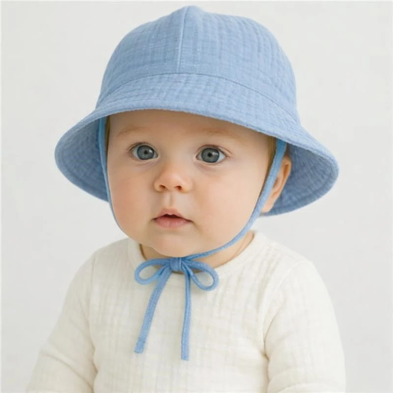 New Baby muslino kepuraitė kūdikiams