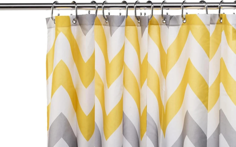 Croydex geltona ir pilka Chevron tekstilinė dušo užuolaida su Hygiene 'n' Clean