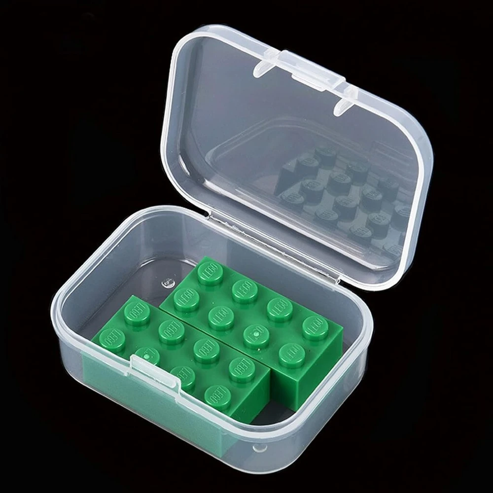 100 mini stačiakampių tuščių plastikinių dėžučių su atlenkiamais dangteliais pakuotė (5,5 x 4 x 2 cm, skaidrios)