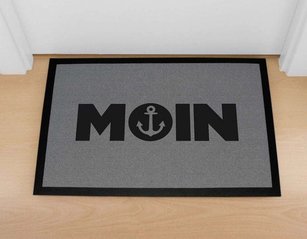 Moonworks® Durų kilimėlis Moin Šiaurės Vokietijos sveikinimai Welcome Hello Neslystantis ir skalbiamas juodas 60 x 40 cm