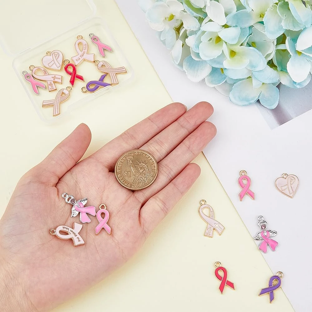 Superfindings 723 dalių "pasidaryk pats" rinkinys papuošalų gamybai krūties vėžio informuotumo didinimui, 9 stilių lydinio emalio kaspinėlio širdelės sparnų pakabukai, 14 stilių karoliukai papuošalų gamybai