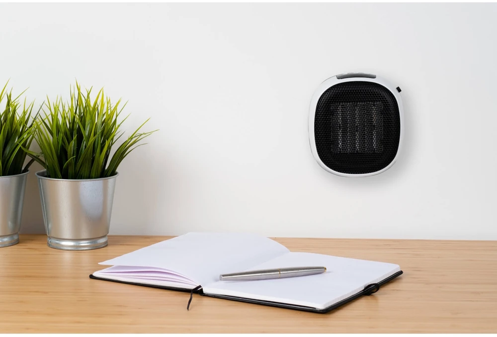 Į lizdą jungiamas keraminis ventiliatorinis šildytuvas kambariui su termostatu ir laikmačiu 700W iki 40m³ Heat Plug-in-700 max Eurom