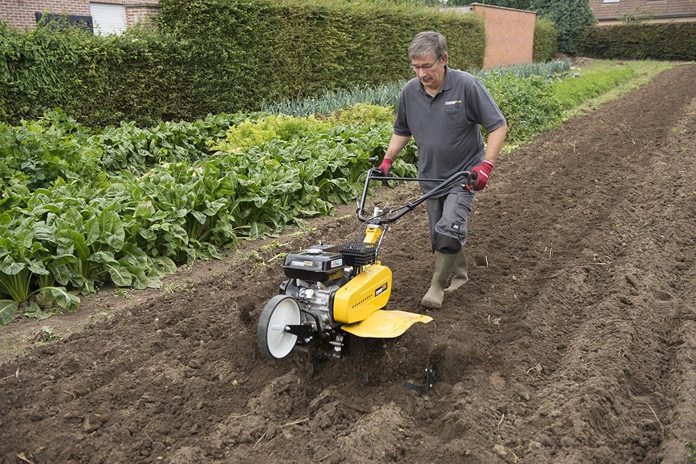 POWERPLUS POWXG7217 benzininis kultivatorius ir žemės freza dirvos apdirbimui ir sodo paruošimui 208cc 4200W 105cm 4-taktis variklis reversas