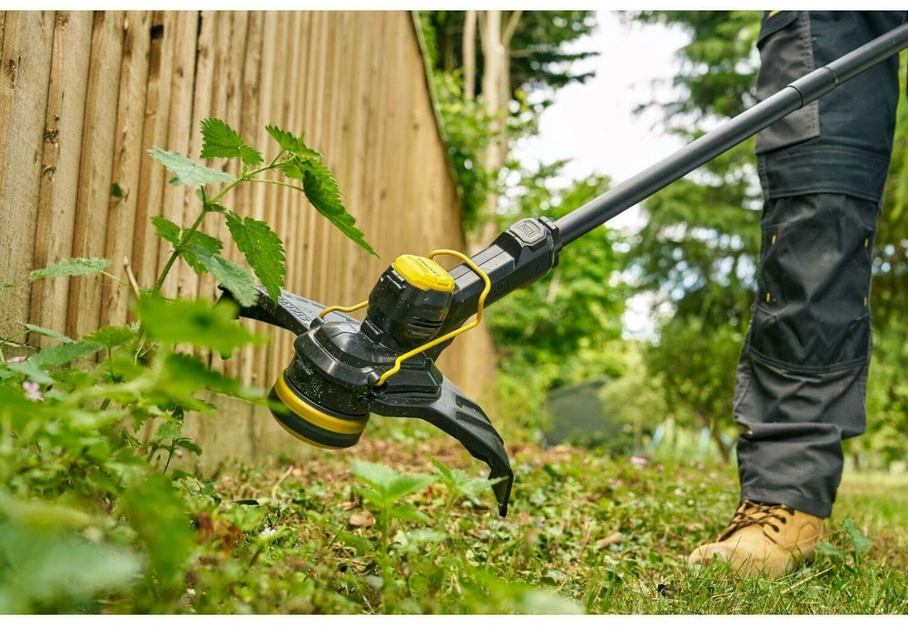Žoliapjovė - trimeris Stanley STCST933B-XJ; 18 V; 33 cm (be akumuliatoriaus ir pakrovėjo)