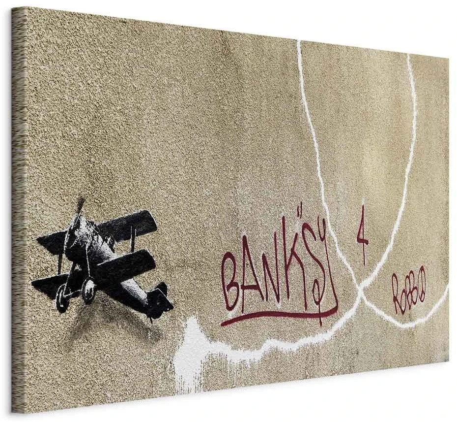 Paveikslas Lėktuvas su raudonu grafičio tekstu (Banksy)