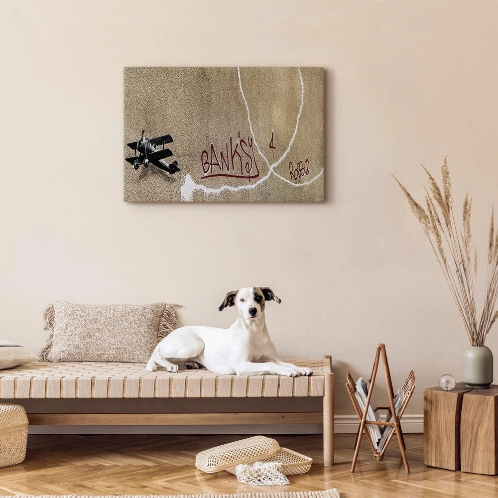 Paveikslas Lėktuvas su raudonu grafičio tekstu (Banksy)