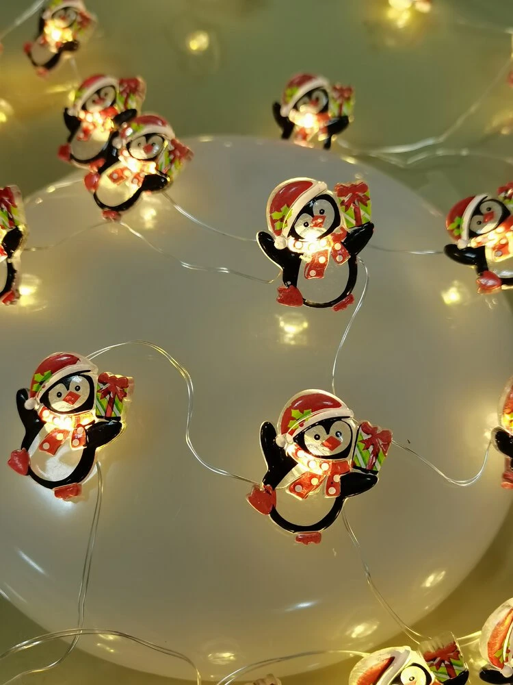 Dekoratyvinė LED Šviesa - Lampki Pingvinas BAT Modee 0.9m 10LED Šiltai Balti Pingvinai