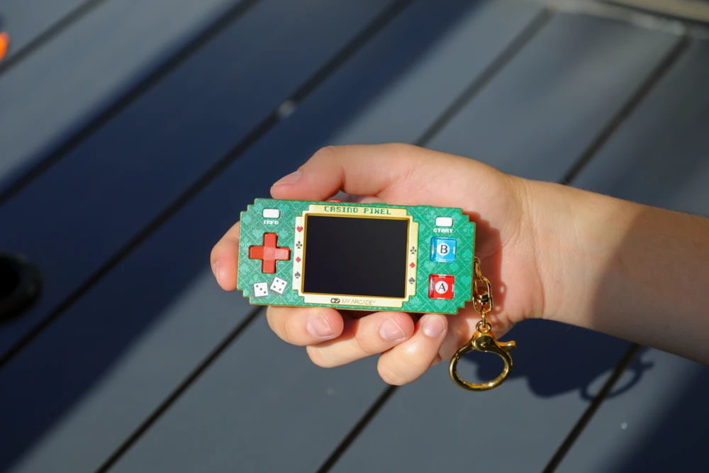 Dreamgear Pixel Pocket Pro Casino Pixel nešiojama žaidimų konsolė (10 žaidimų)