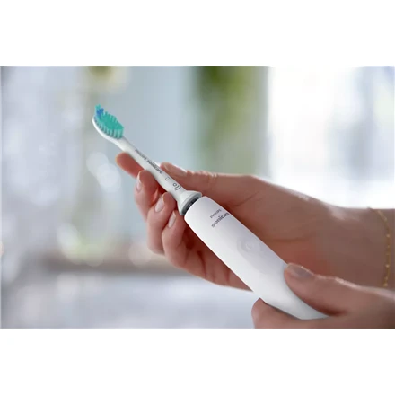 Philips Sonicare elektrinis šepetėlis rankose